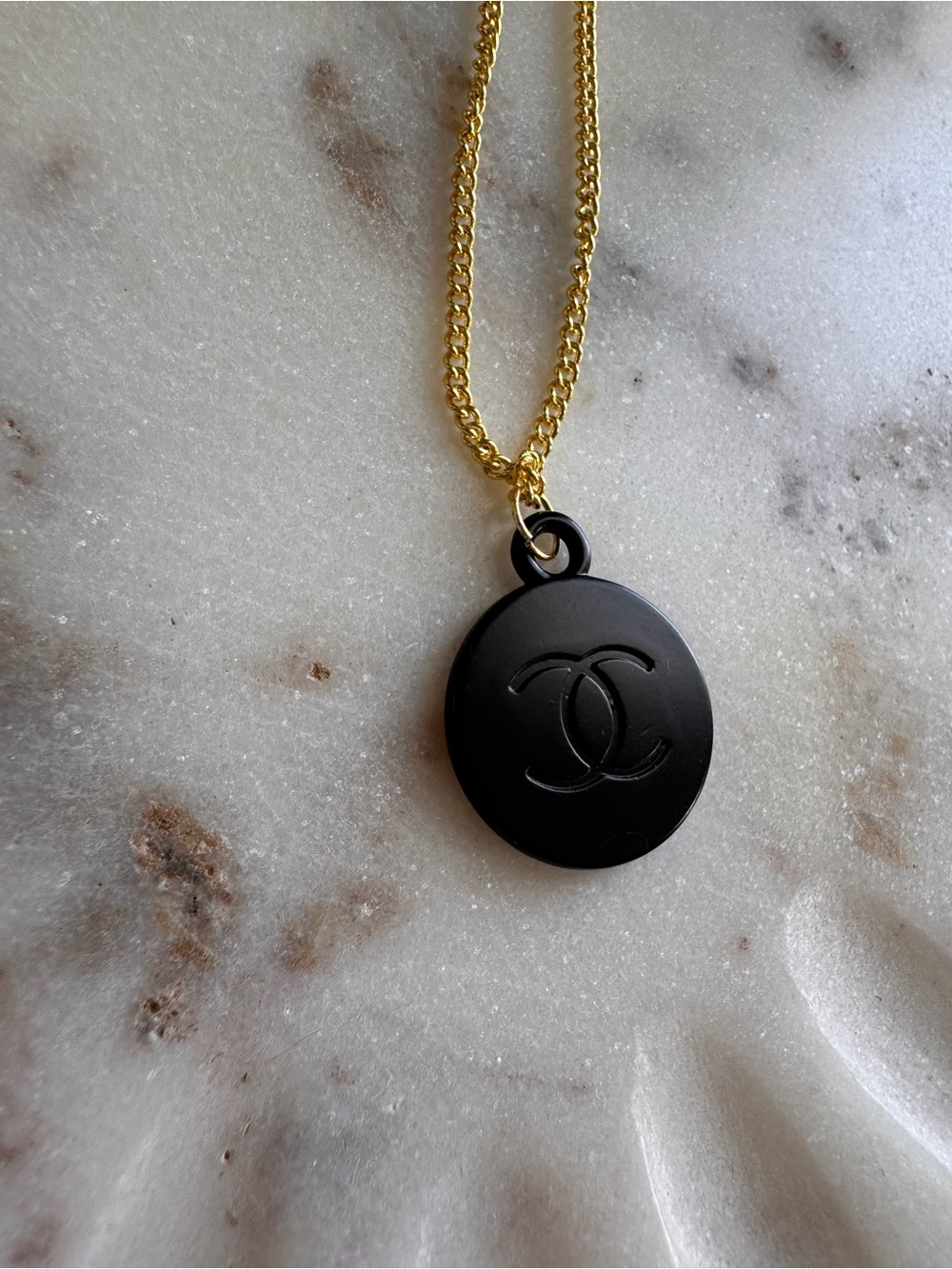 CHANEL Gold Chain with Black CC Medallion Pendant